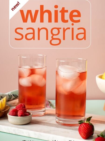 White Sangria with apples, strawberries, cherries, and hibiscus!